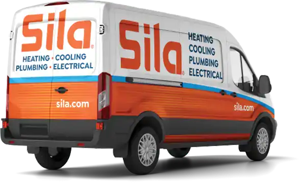 A white van with "Sila" branding and text listing heating, cooling, plumbing, and electrical services, along with the website sila.com.